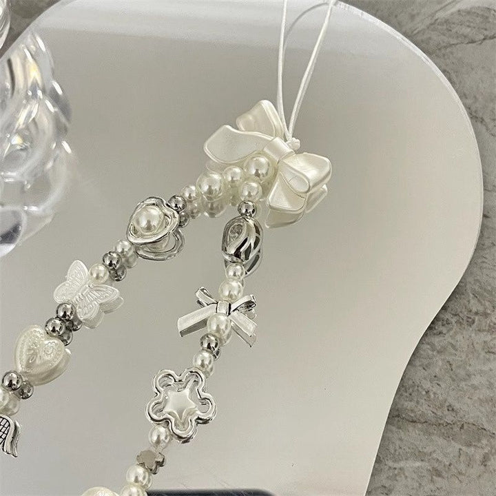Herz und Schmetterling Charm Perlenarmband Karnz