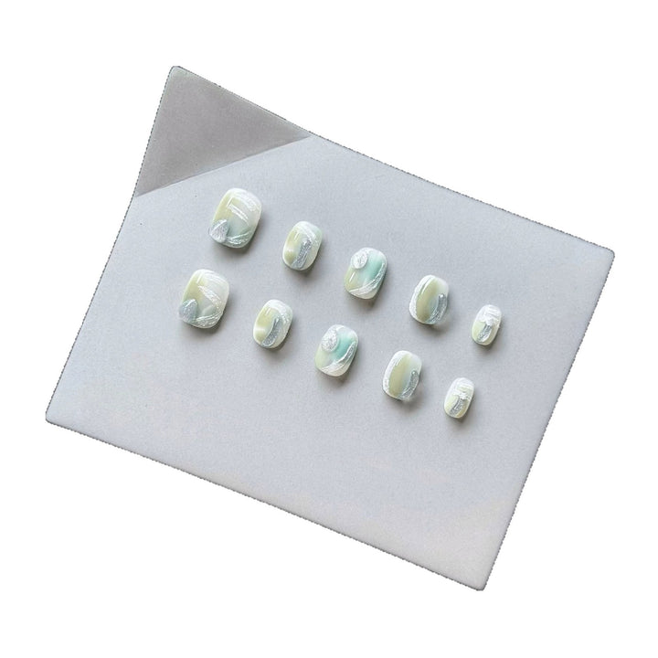 Künstlerisches Press-On-Nagelset mit glänzendem Marmor-Design