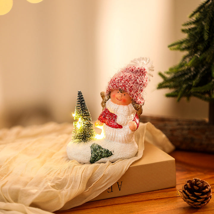 Niedliche Weihnachtsfigur mit Lichterschmuck Karnz