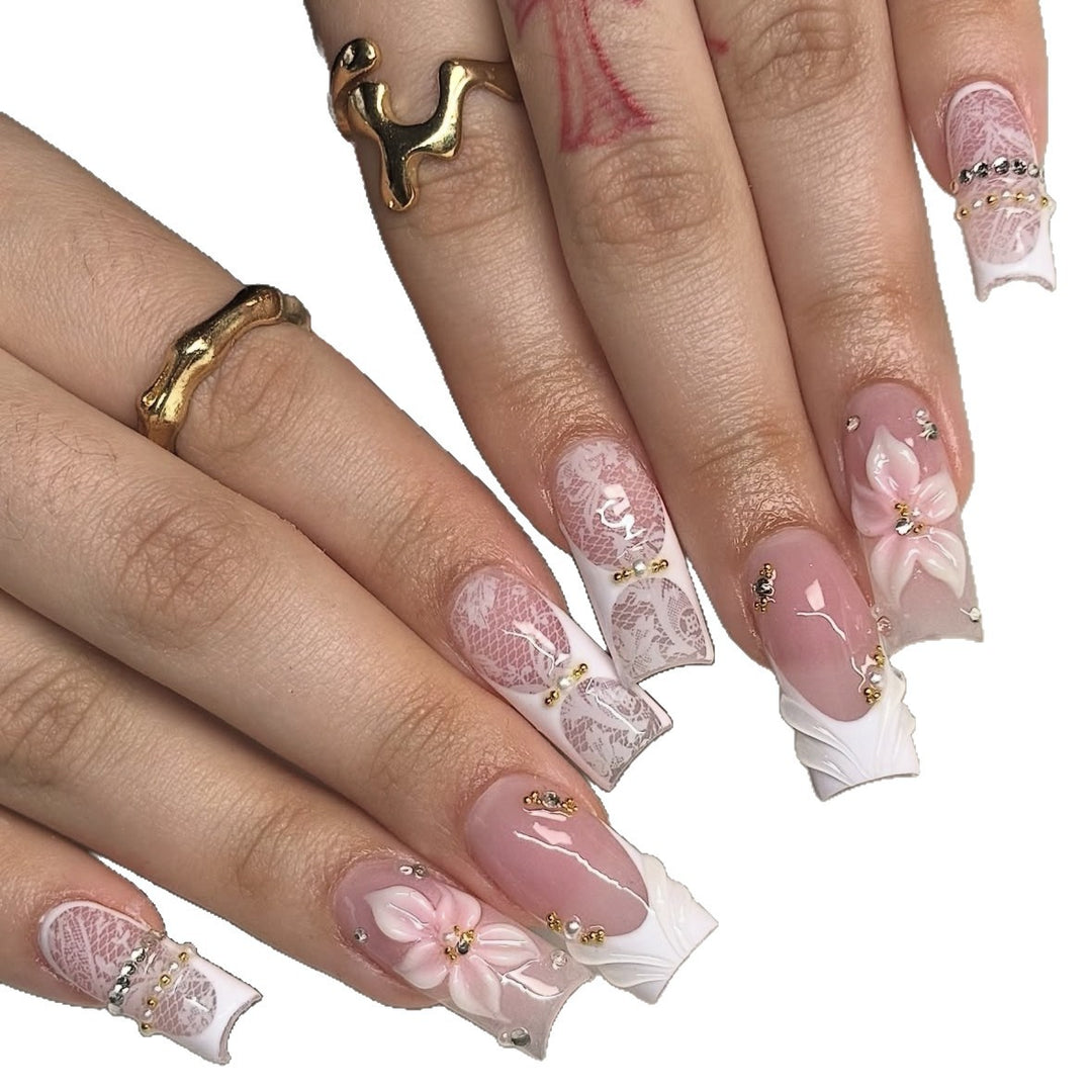 Elegante florale Spitzen-Design Press-On Nagel Tipps Karnz