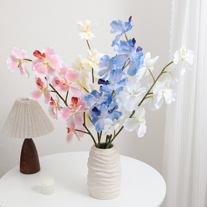 Künstlicher Orchideenstrauß mit realistischen Details Karnz