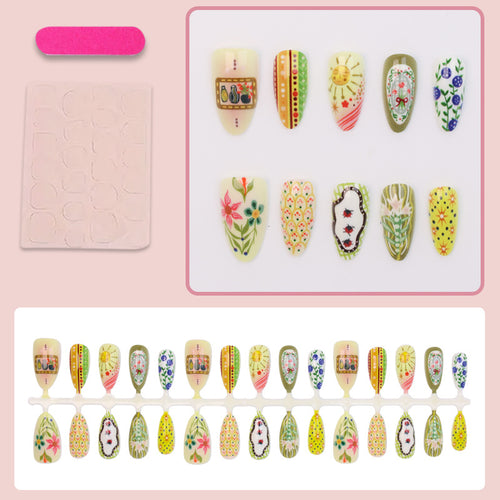 Kunstnagelset mit aufwendigen floralem und buntem Desig Karnz