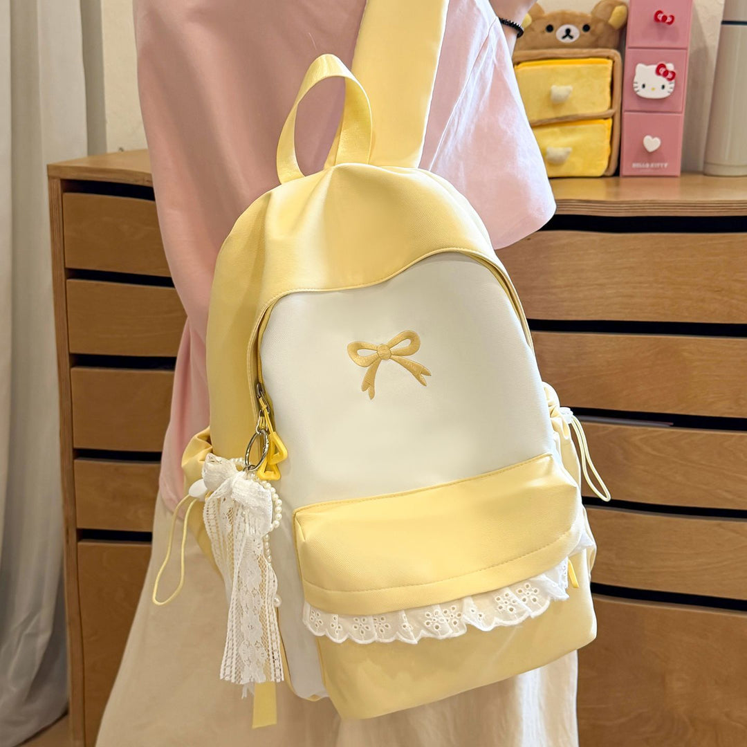 Schleifenverzierte Rucksack