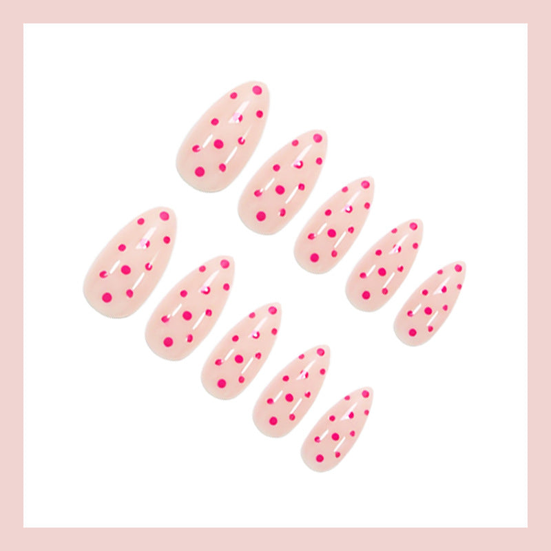 Kunstnagelset mit verspielten Punkten und elegantem Design Karnz