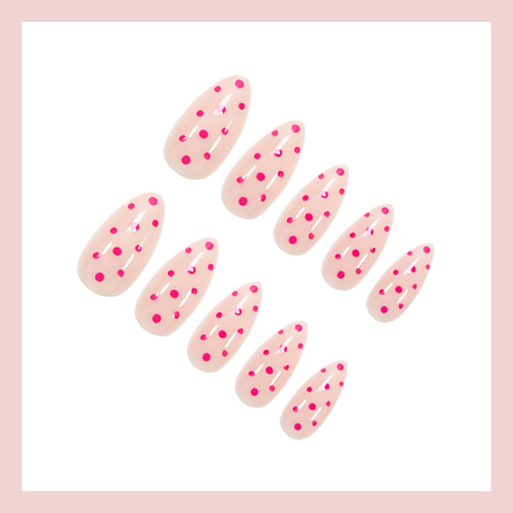 Kunstnagelset mit verspielten Punkten und elegantem Design Karnz