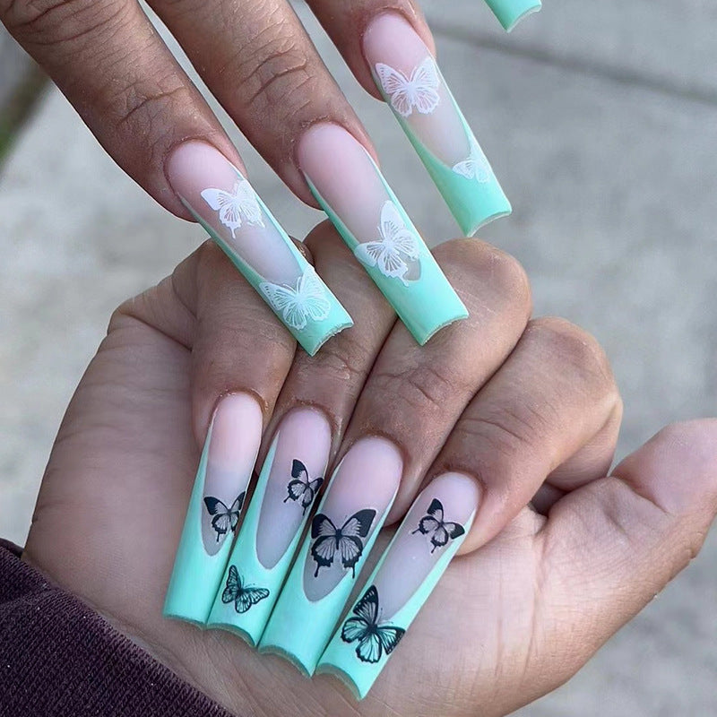Künstliche Nagelverlängerungen mit Schmetterlingsdesign Karnz