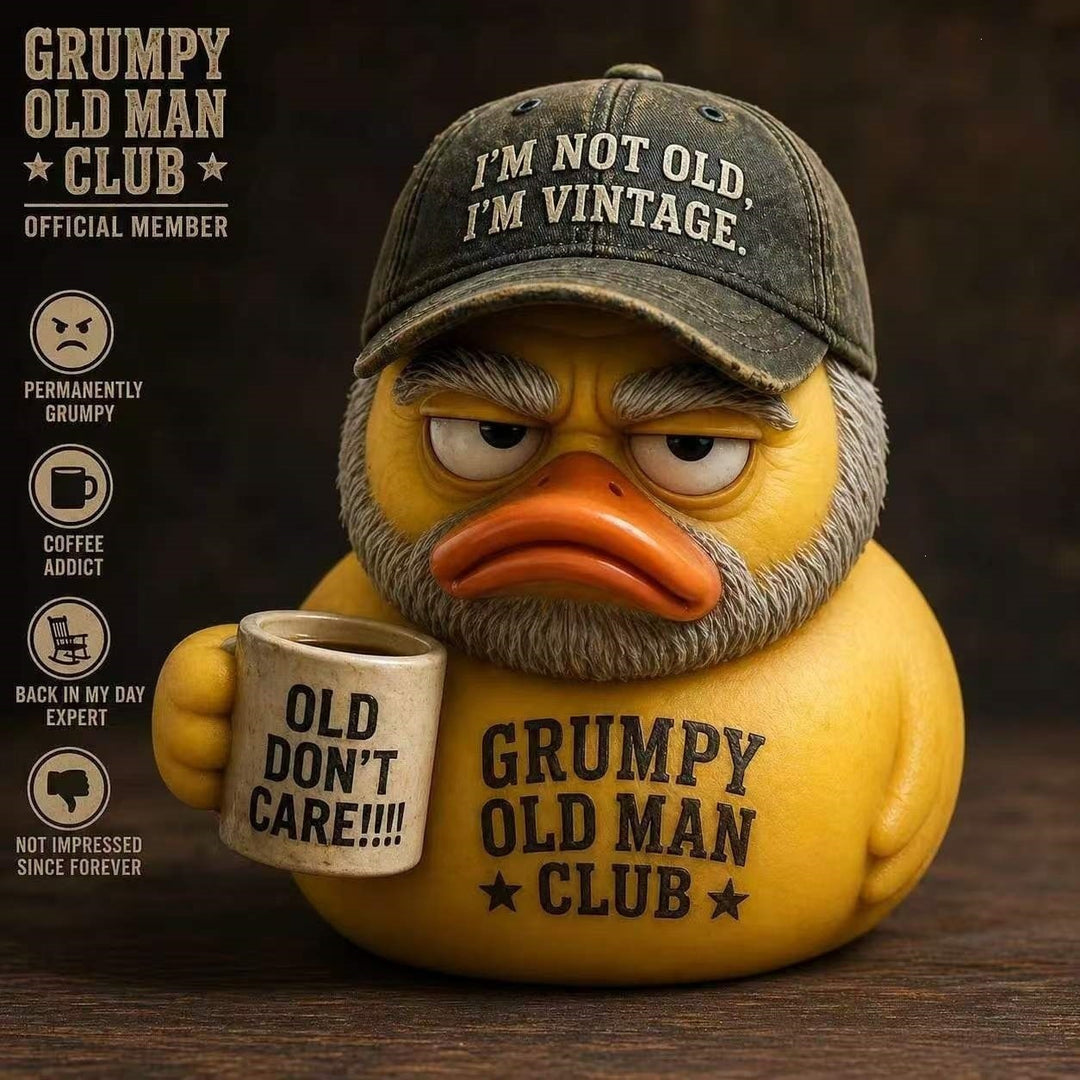 Lustige Gummi-Ente mit Vintage Hut und Becher Karnz