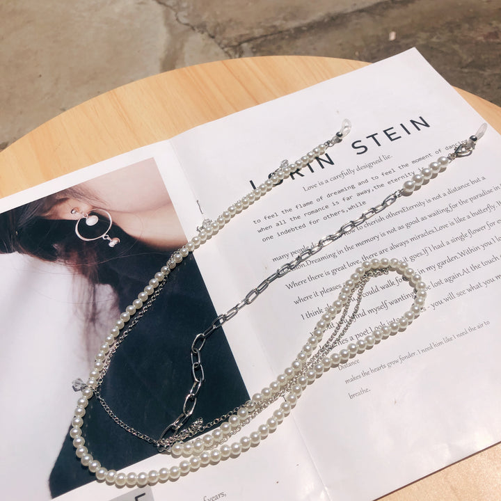 Elegante mit Perlen akzentuierte Brillen-Kette Karnz