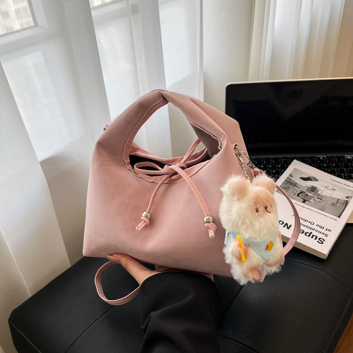 Stylische und funktionale Drawstring-Handtasche Karnz