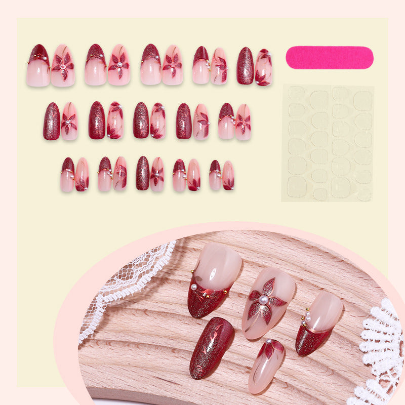 Elegantes Druck-On-Nagelset mit floralem und gem-ähnlichem Akzent Karnz