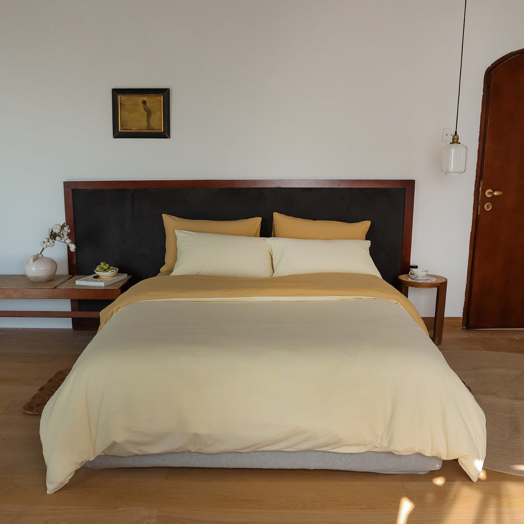 Atmungsaktives Wendebettwäsche-Set aus Bio-Baumwolle mit leichter Steppdecke und Kissenbezügen