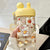 Damen Trinkflasche mit integriertem Tiermotiv und praktischem Tragegriff Karnz