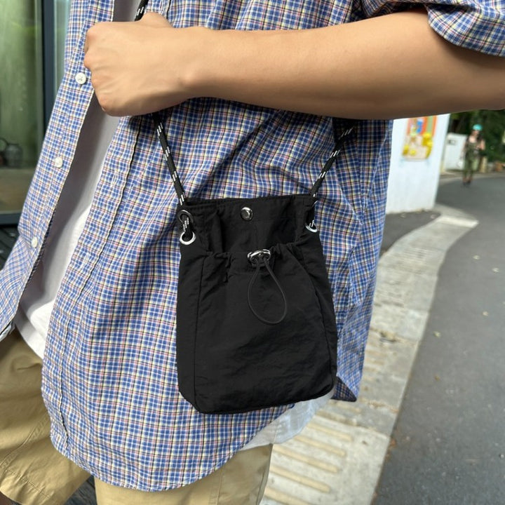 Mini Kordelzug Umhängetasche Karnz
