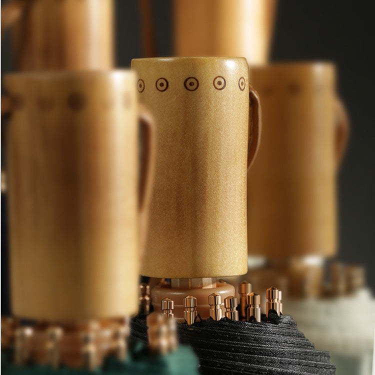 Damen eleganter Faltschirm mit ergonomischem Design Karnz