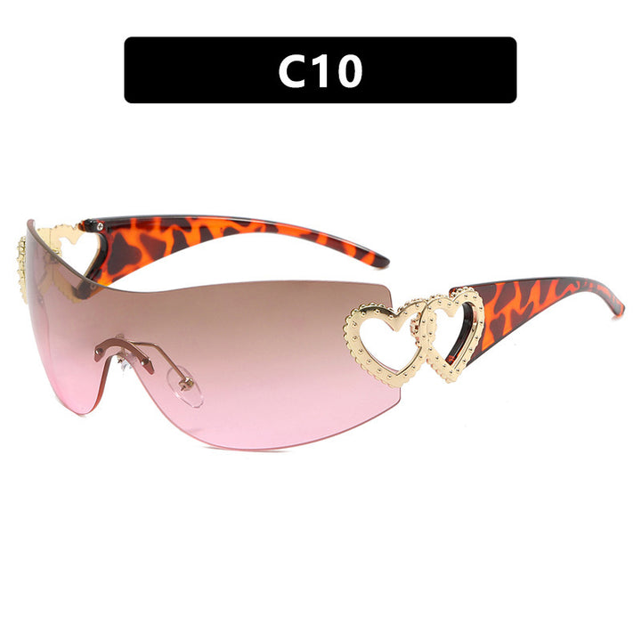 Damen sportliche Sonnenbrille im trendigen Shield-Design mit Herz-Akzenten Karnz