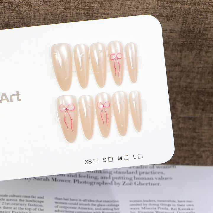 Elegantes Press-On-Nagelkunst-Set mit Schleifenakzenten Karnz
