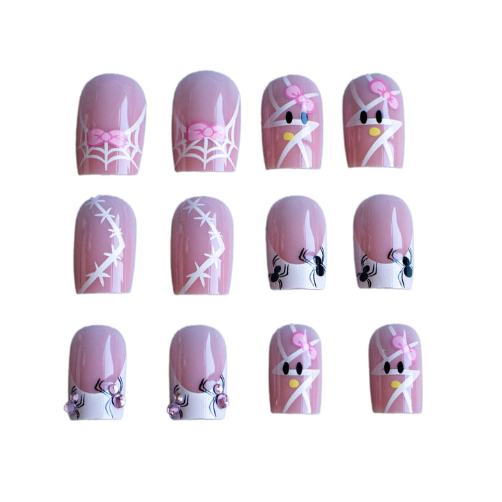 Dekoratives Nagelkunst-Set mit Schleife und Spinnennetzdesign