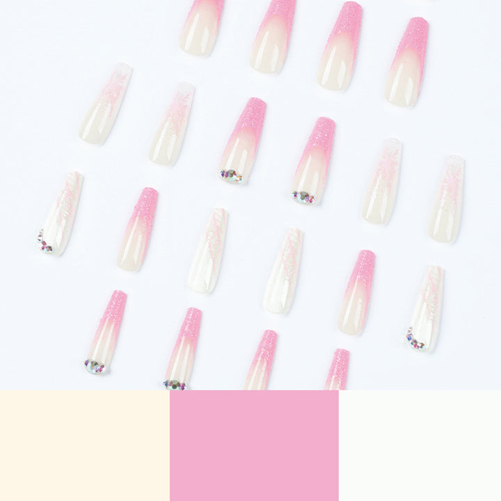 Kunstvolle Stiletto-Nägel mit Glitzer- und Schneeflockendesign Karnz
