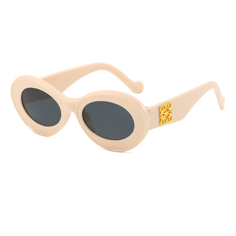 Damen modische Sonnenbrille mit ovalem Rahmen und goldenen Applikationen Karnz
