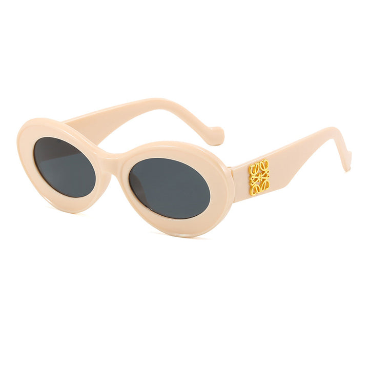Damen modische Sonnenbrille mit ovalem Rahmen und goldenen Applikationen Karnz