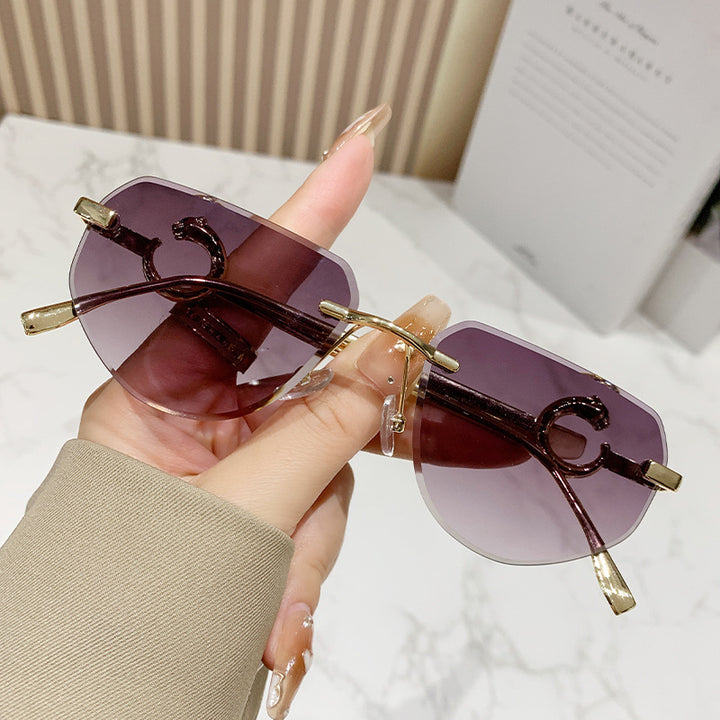 Damen trendige schicke Sonnenbrille im modernen Design mit filigranem Metallrahmen Karnz