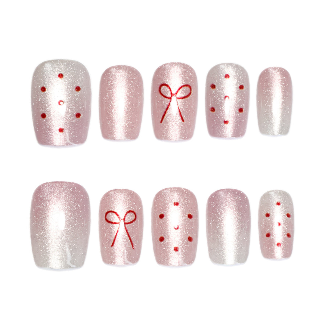 Künstliche Nagelkunst mit niedlichen Schleifen-Design Karnz
