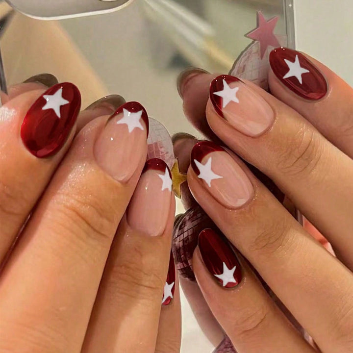 Kunstnagelset mit glamourösen Sternen-Design Karnz