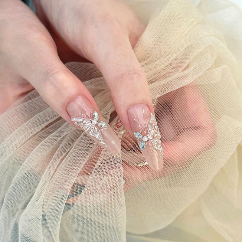 Glamouröse Stiletto Press-On Nagelkunst Set mit eleganten Edelsteinen Karnz