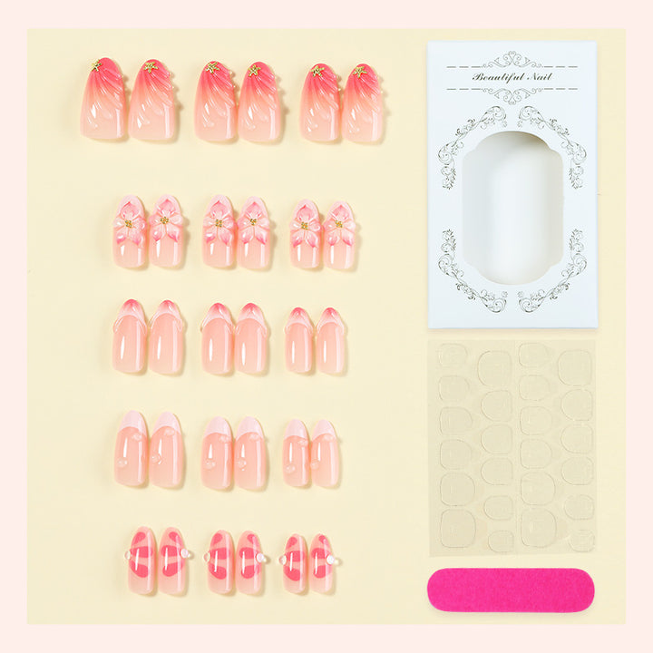 Kunstnagelset mit floralem Design und zartem Farbverlauf Karnz
