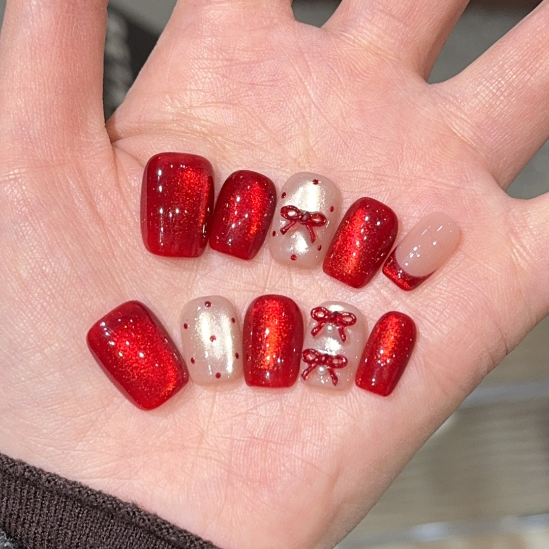 Elegante Kunstnagelset mit Dekorativer Schleifenakzenten Karnz
