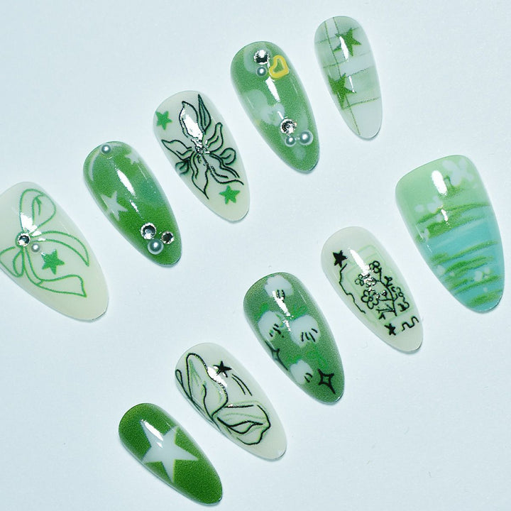 Künstlerische grüne Nagelverbesserungen Karnz