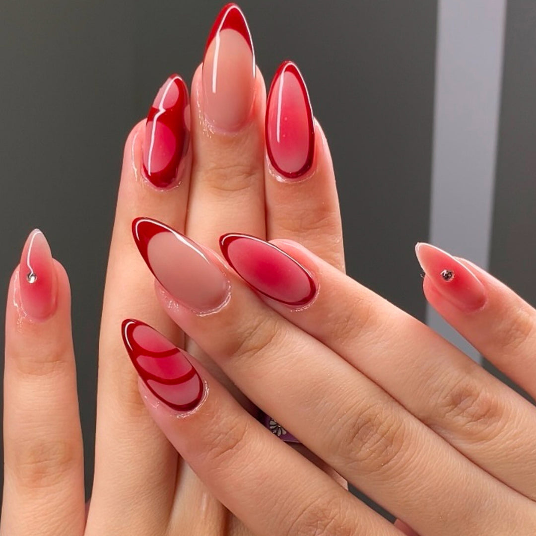 Künstlerisches Stiletto Press-On Nagelset Karnz