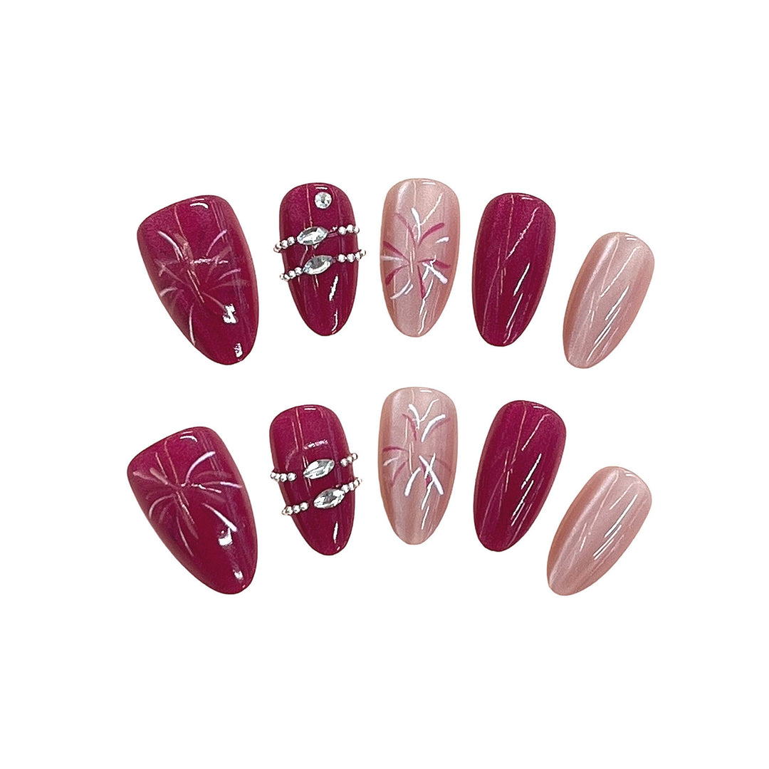 Künstlerisches Press-On-Nagelset mit floralen Mustern und Edelsteinakzenten Karnz