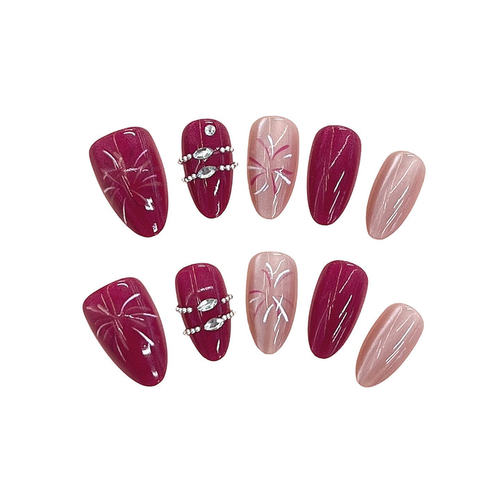 Künstlerisches Press-On-Nagelset mit floralen Mustern und Edelsteinakzenten Karnz