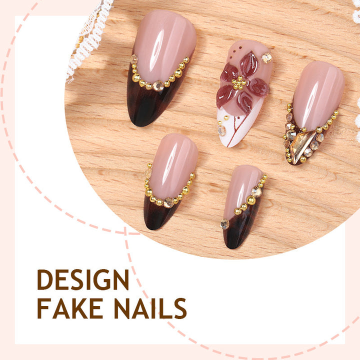 Kunstnagelset mit elegantem Blumen- und Glitzerakzent Karnz