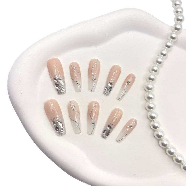 Elegantes Press-On-Nagelkunstset mit Juwelen und Glitzer