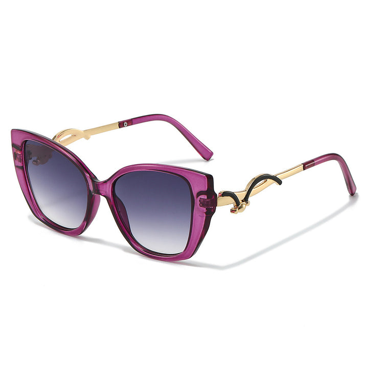 Übergroße Geometrische Katzenaugen-Sonnenbrille mit goldenen Akzenten Karnz