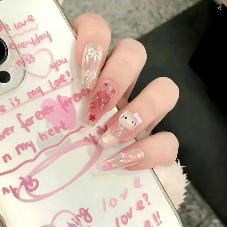 Kunstvolle Nagelset mit 3D-Blumen- und Schleifendetails Karnz