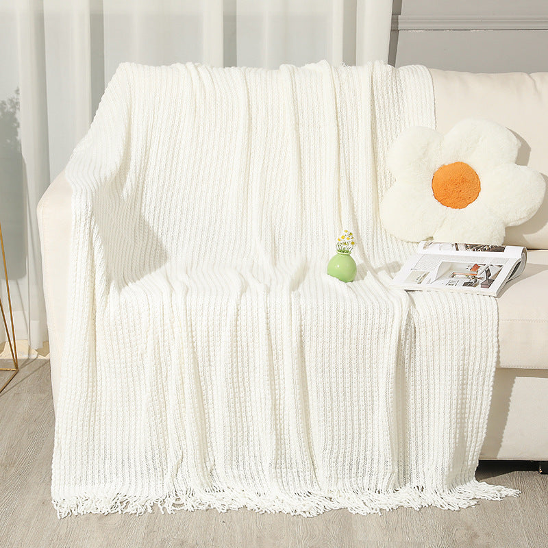 Strukturierte Strickwurfdecke