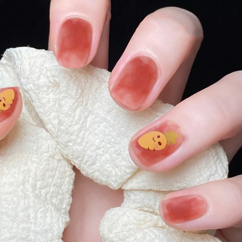 Kreative Nagelkunst mit fröhlichem Motiv Karnz
