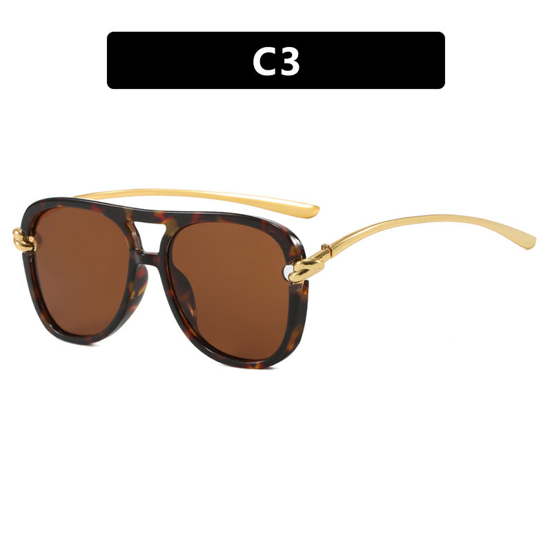 Damen sportliche Sonnenbrille mit breitem Kunststoffrahmen und UV-Schutz Karnz