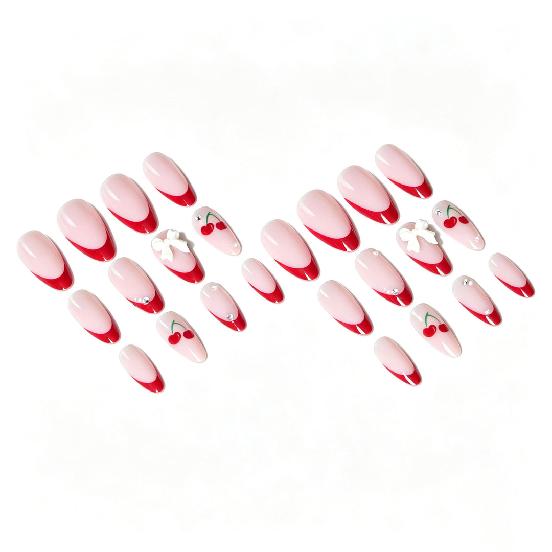 Künstlerisches Kirsch- und Schleifen-Nageldesign