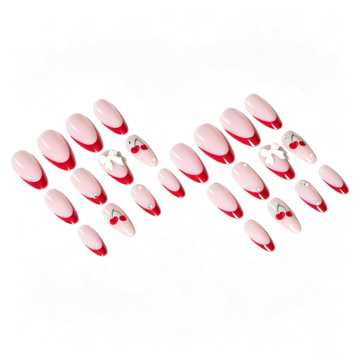 Künstlerisches Kirsch- und Schleifen-Nageldesign