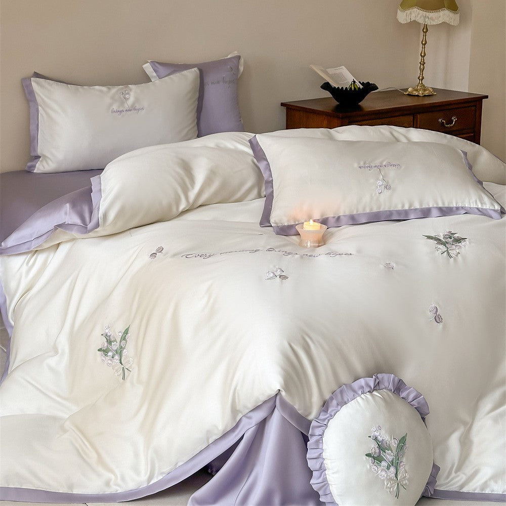Satin-Bettbezug-Set mit floraler Stickerei, Wendefunktion und Zierkissen