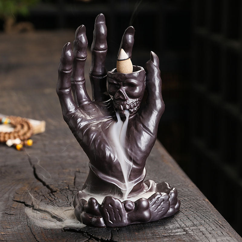Künstlerischer Schädel Hand Räuchergefäß