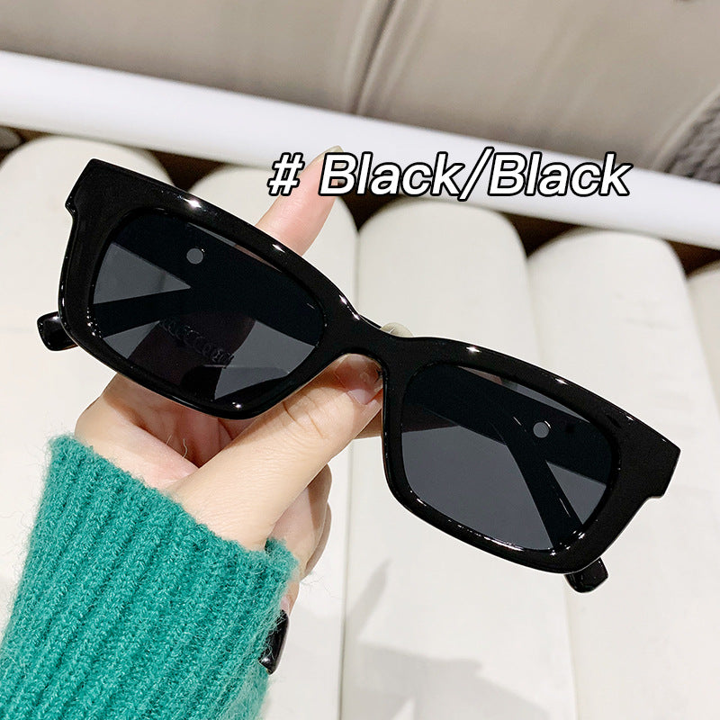 Damen moderne, geometrische Sonnenbrille mit stilvollem, robustem Rahmen Karnz