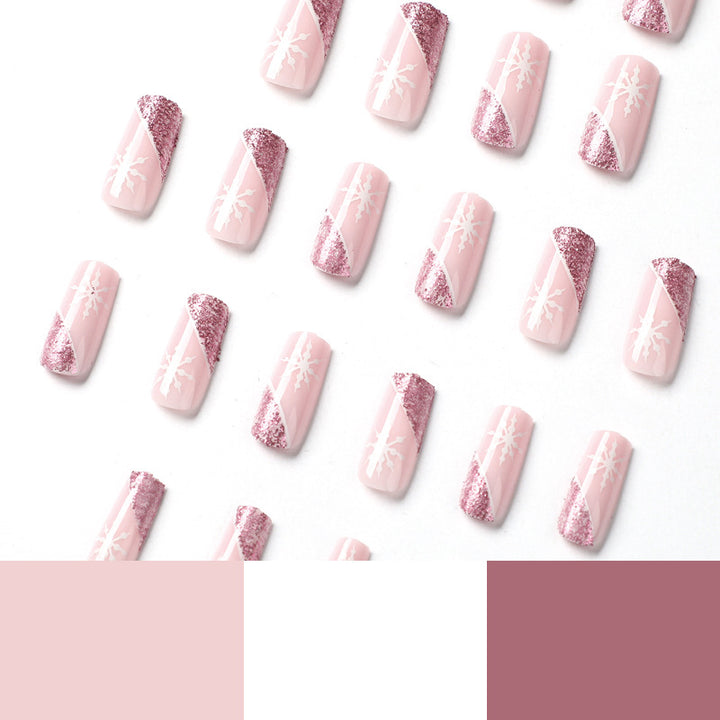 Kunstvolle Nagelverlängerungen mit festlichem Glitzer und Schneeflockendesign Karnz
