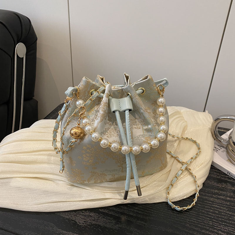 Elegante Blumenmuster-Zugband-Eimer-Tasche Karnz