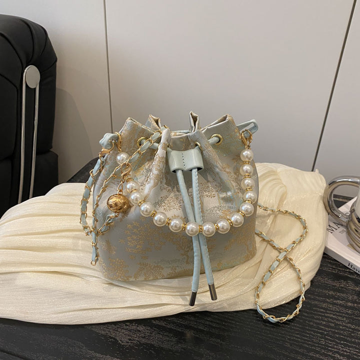 Elegante Blumenmuster-Zugband-Eimer-Tasche Karnz