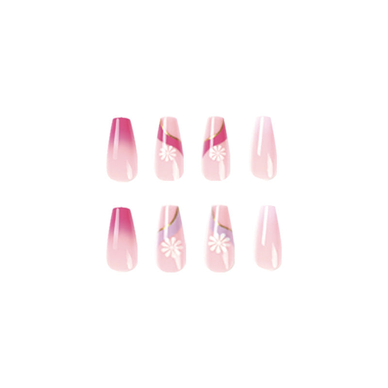 Kunstvolle Nagelverlängerungen mit buntem Ombre-Design und floralen Akzenten Karnz